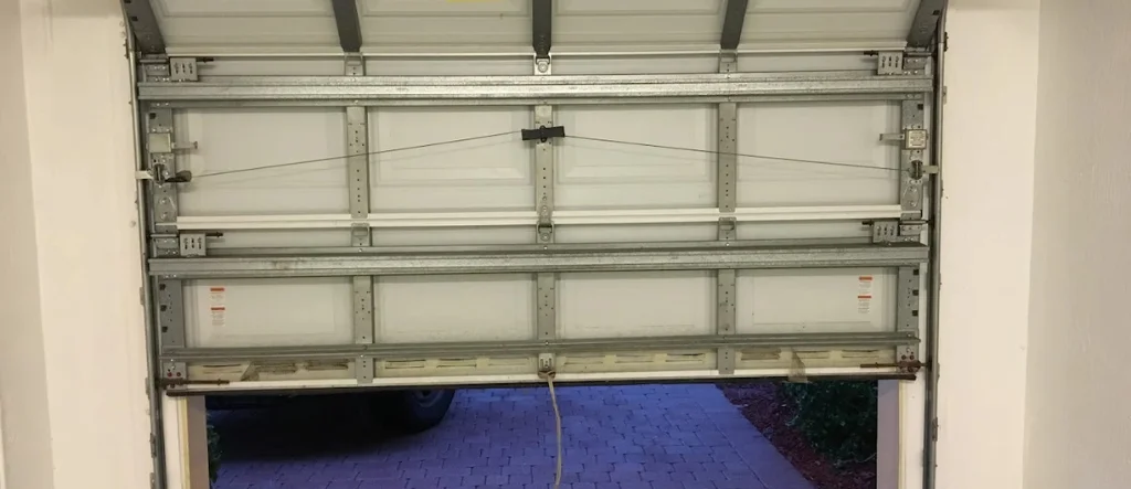 garage door off track.